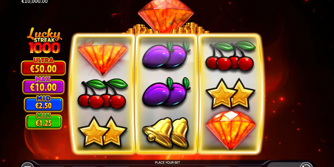 Automat Lucky Streak 1000 od Endorphiny: 3 válce s rubíny, švestkami, třešněmi, hvězdami a zvonky, vlevo čtyři jackpoty